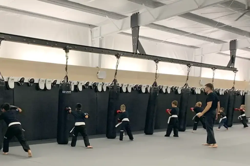 Coach Nolan training kids in Martial Arts
